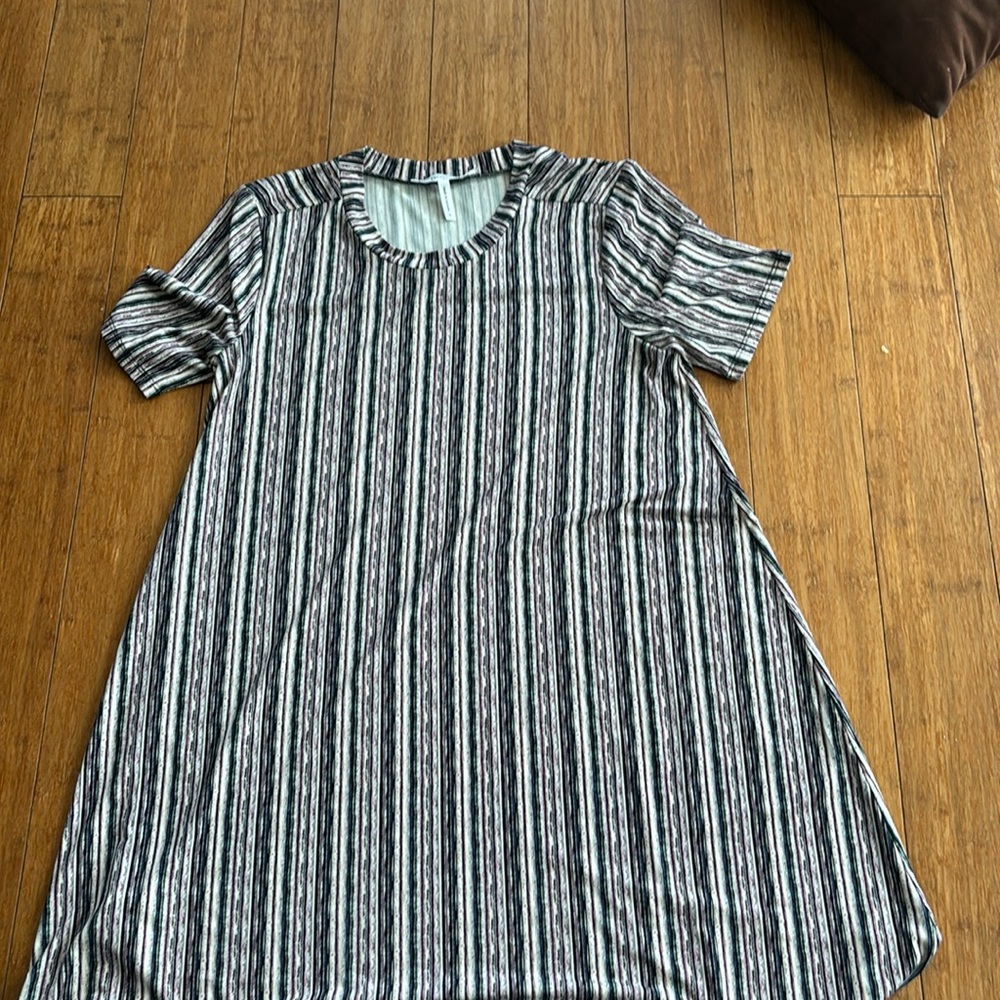 This is a stripped multi color BCBGeneration small dress.